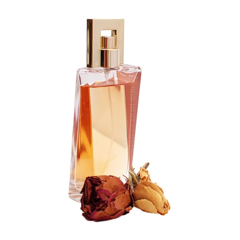 The bottle and the dried roses on pure white - the roses are a prop Amazon does not allow