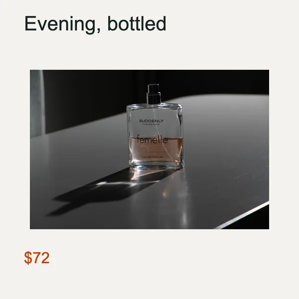 Glass perfume bottle on a dark table, headline "Evening, bottled", price $72